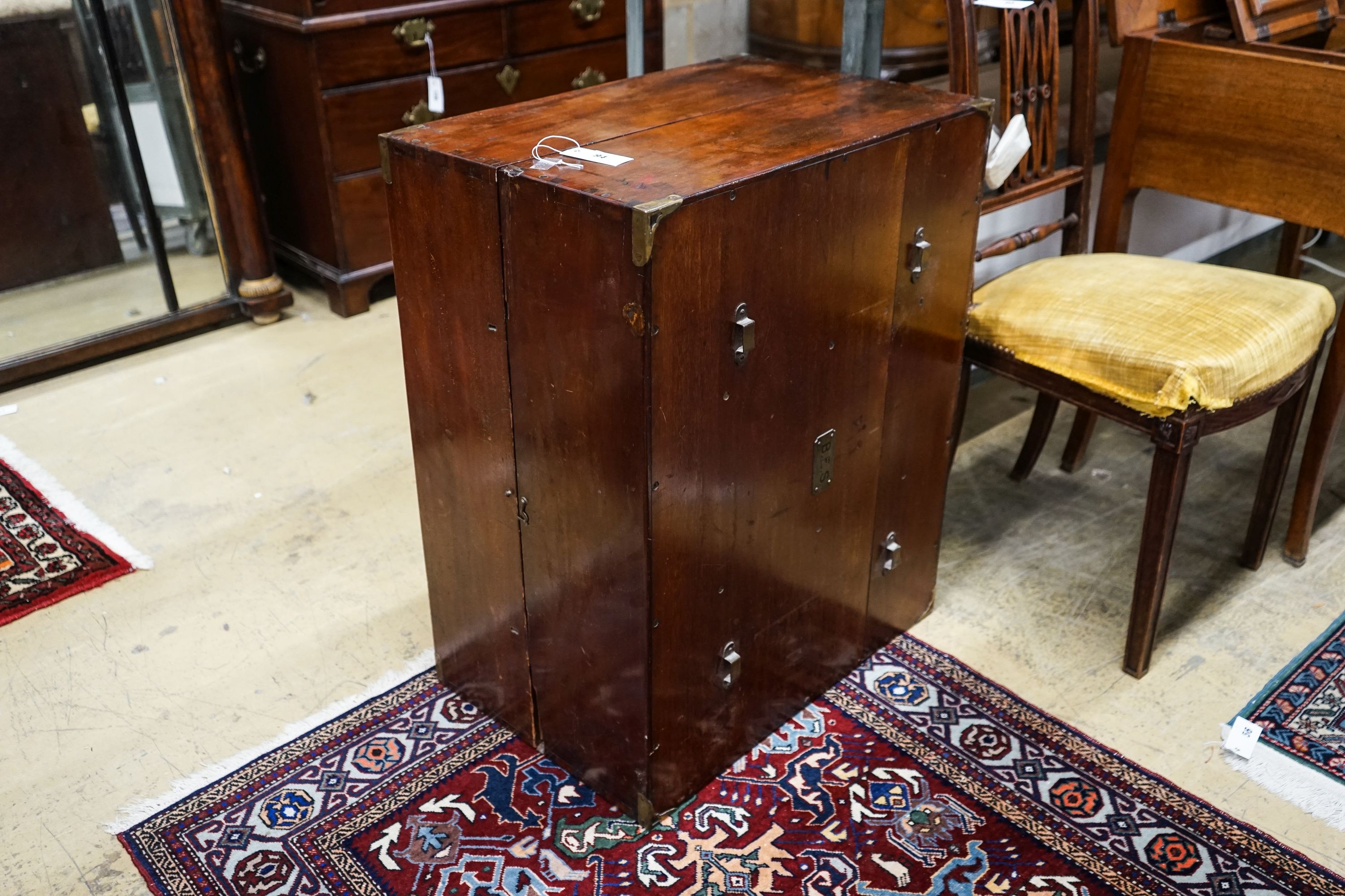 A 19th century brass mounted mahogany campaign trunk with shelved interior, length 60cm, depth 40cm, height 74cm